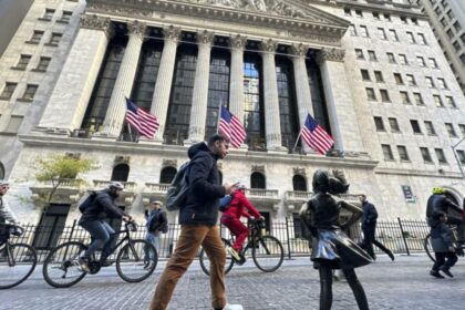 Wall St rebounds on tech rally, benign inflation data