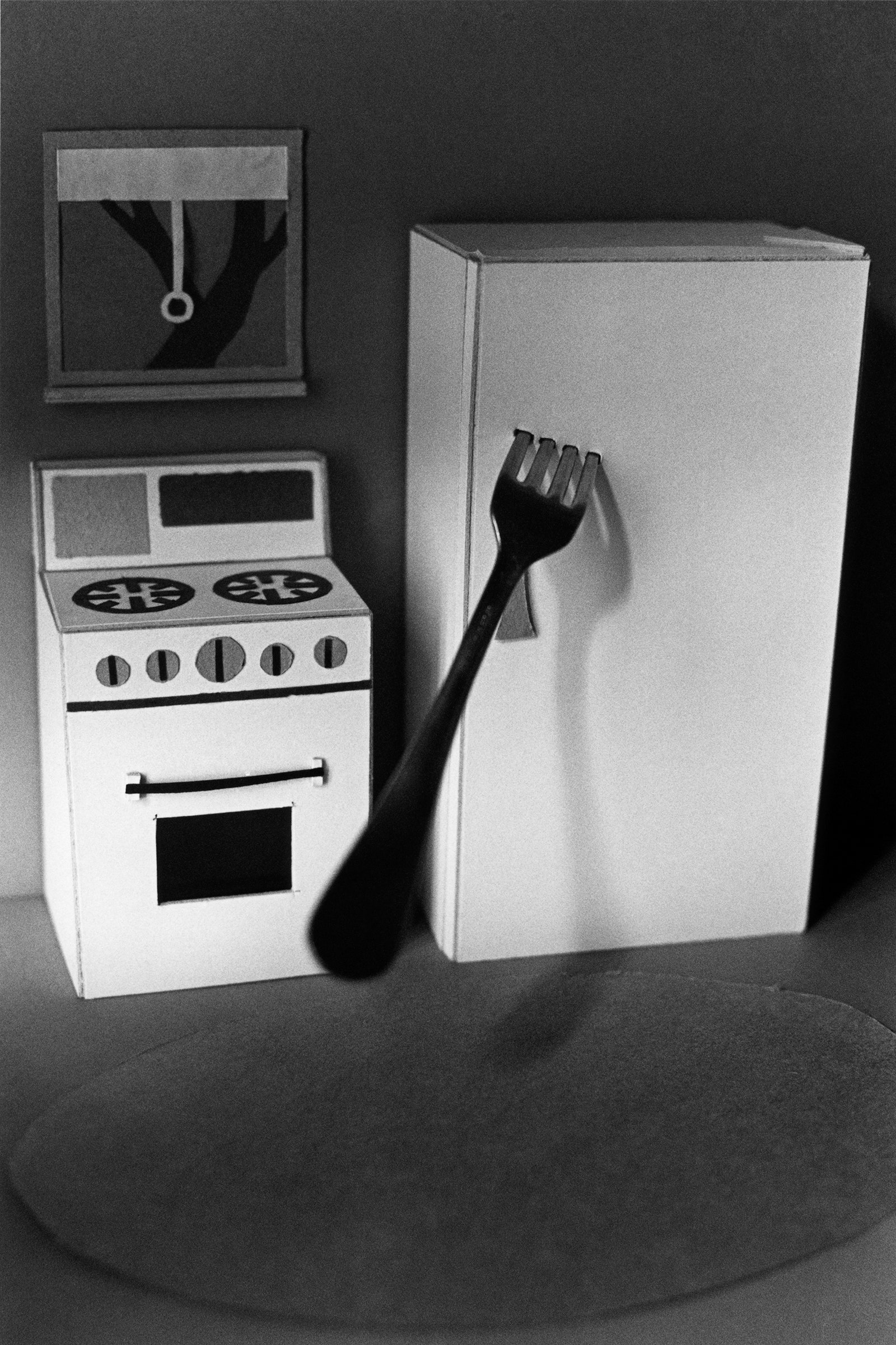 A paper model of a kitchen.