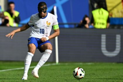 A masked Kylian Mbappe playing for France against Belgium in the last 16 at Euro 2024