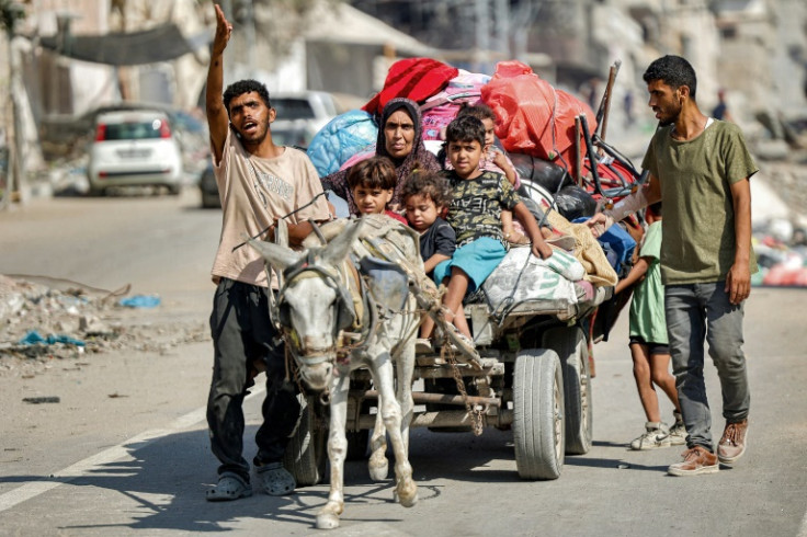 A family with a donkey cart in the Tuffah district in the east of Gaza City on July 8, 2024