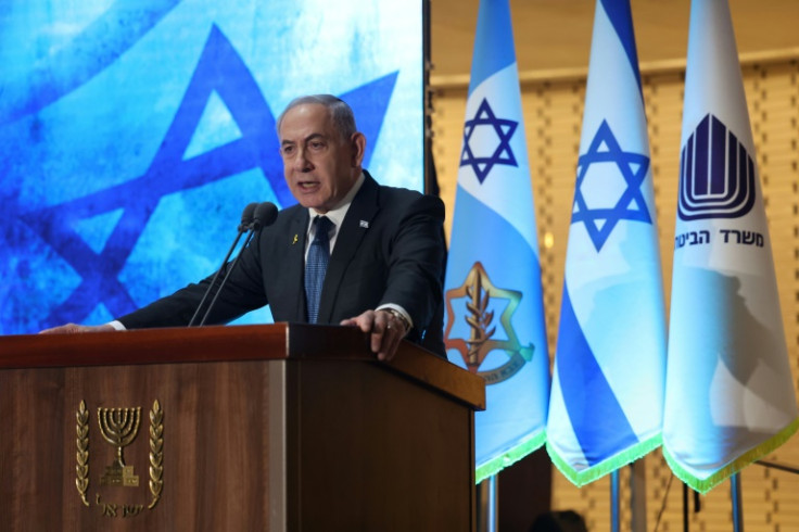 Israeli Prime Minister Benjamin Netanyahu speaks during a commemoration ceremony for soldiers killed during the 2014 Gaza war at the Memorial Hall on Mount Herzl in Jerusalem on July 16, 2024