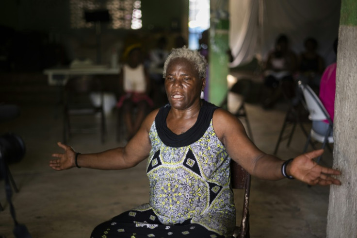 Philomene Dayiti, 65, says she wants nothing more than to return home