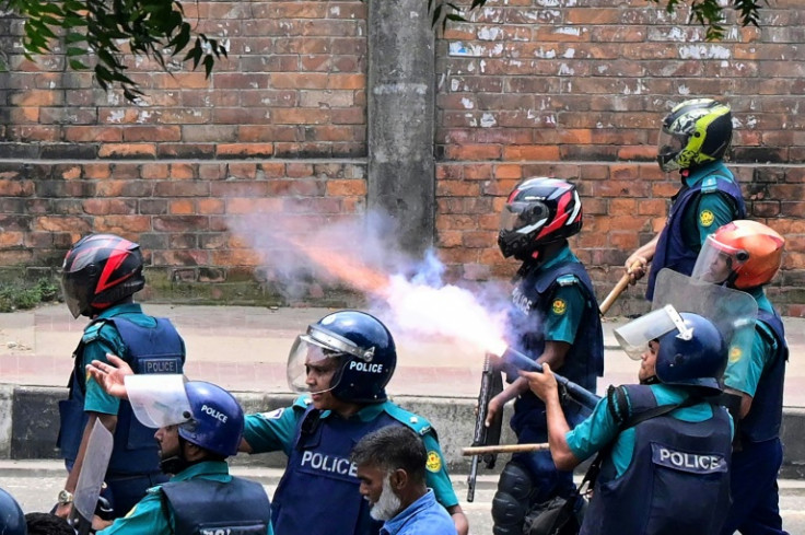 Riot police again fired tear gas and rubber bullets to disperse crowds of protesters