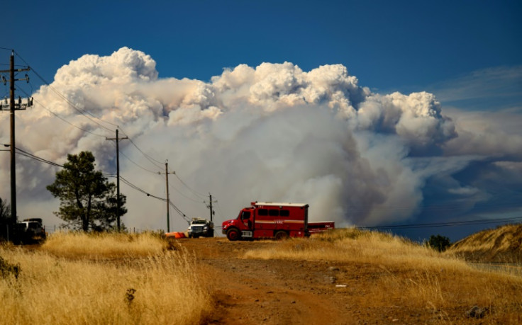Smoke rises as the Park Fire continues to burn near Chico, California on July 26, 2024