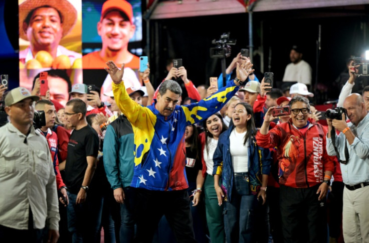 Venezuelan President Nicolas Maduro reacts after results were announced in Caracas in the country's presidential election, in which Maduro was declared the winner and opposition groups protested