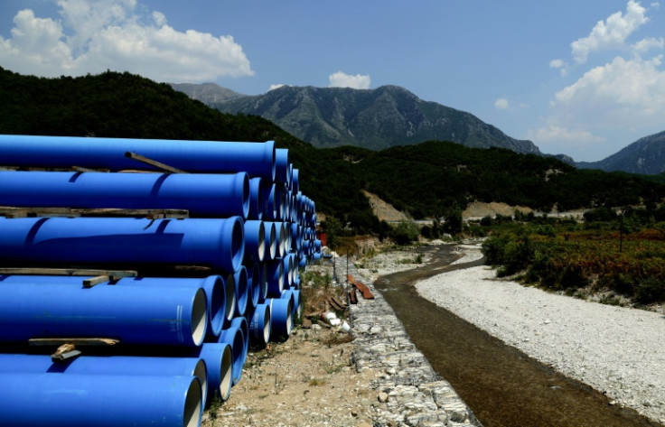Water pipes stored on the bank of the Shushica River, near the Albanian city of Vlore