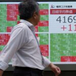 Asia shares set to end brutal week on a high