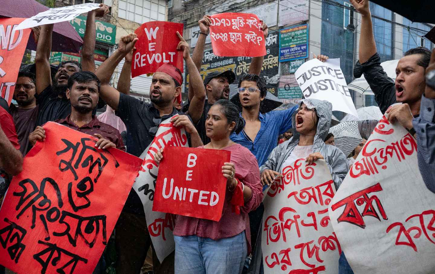 Protesters during a demonstration demanding justice for the victims arrested and killed in the recent violence over quotas in government jobs.