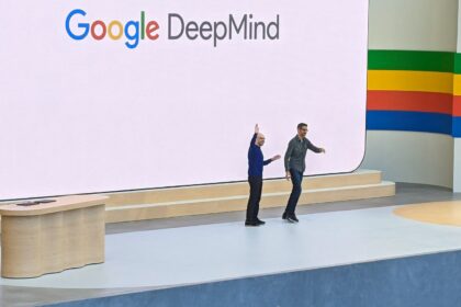 Google DeepMind chief Demis Hassabis (L) and Google chief executive Sundar Pichai open the tech titan