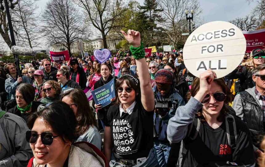 Reproductive justice demonstrators outside the US Supreme Court on Tuesday, March 26, 2024.