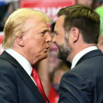 Former US President Donald Trump greets US Senator and vice presidential nominee J.D. Vance as they attend their first campaign rally together.