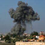 Smoke billows following Israeli bombardment in Nuseirat in the central Gaza Strip on August 11, 2024