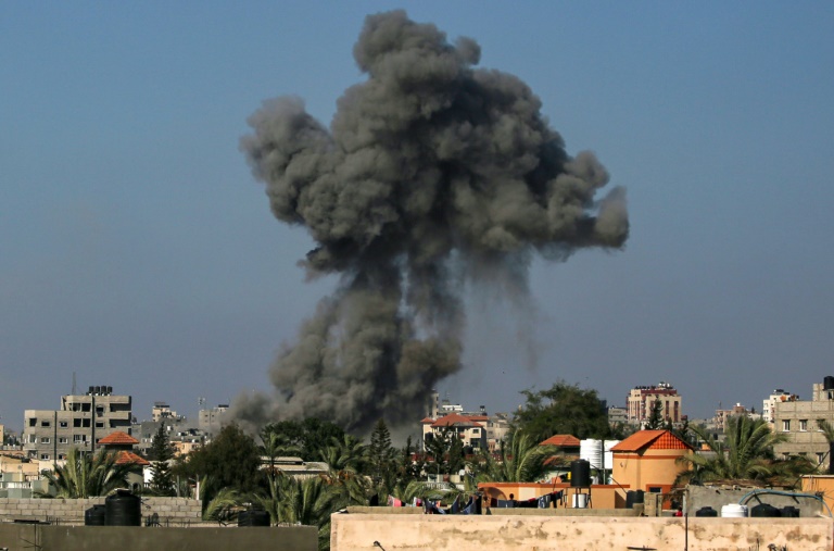 Smoke billows following Israeli bombardment in Nuseirat in the central Gaza Strip on August 11, 2024