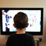 Representational image of a child watching television