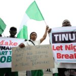 Government officials urged young activists in Nigeria to reject rallies and allow time for economic reforms to take hold