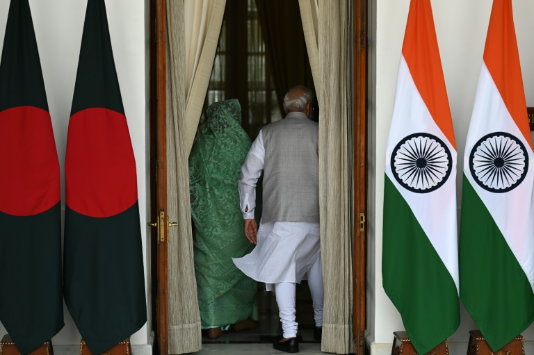 India's Prime Minister Narendra Modi (R) and now ousted Bangladeshi prime minster Sheikh Hasina, seen here in 2022, were once close allies