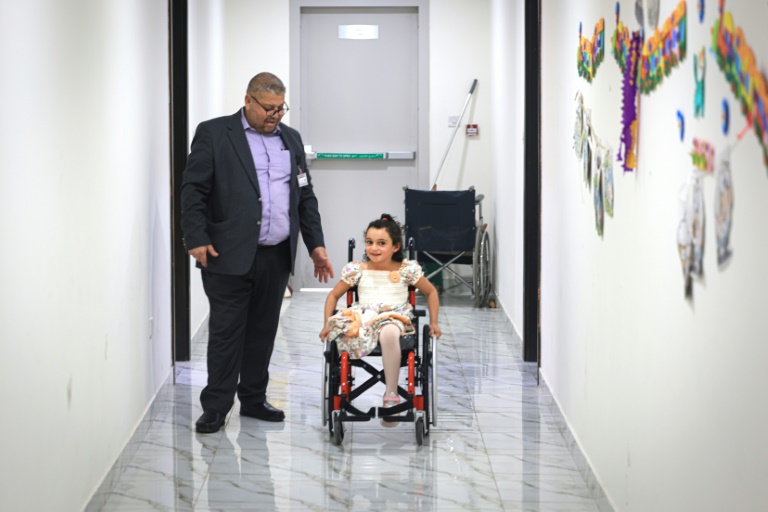 Maryam Ahmed, six, is among some 300 child amputees from Gaza who are receiving therapy at the Thumama complex in Qatar, 2022 World Cup accommodation now being used to house Gaza war evacuees and their carers