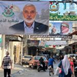 A banner bearing the picture of slain Hamas leader Ismail Haniyeh in the Palestinian refugee camp of Ain al-Hilweh in Lebanon