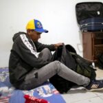 Colombia-based Venezuelan migrant Jose Ochoa packs his belongings as he prepares to travel to the United States via the dangerous Darien Gap