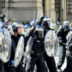 Far-right protesters threw bricks at police in the northwestern English city of Liverpool