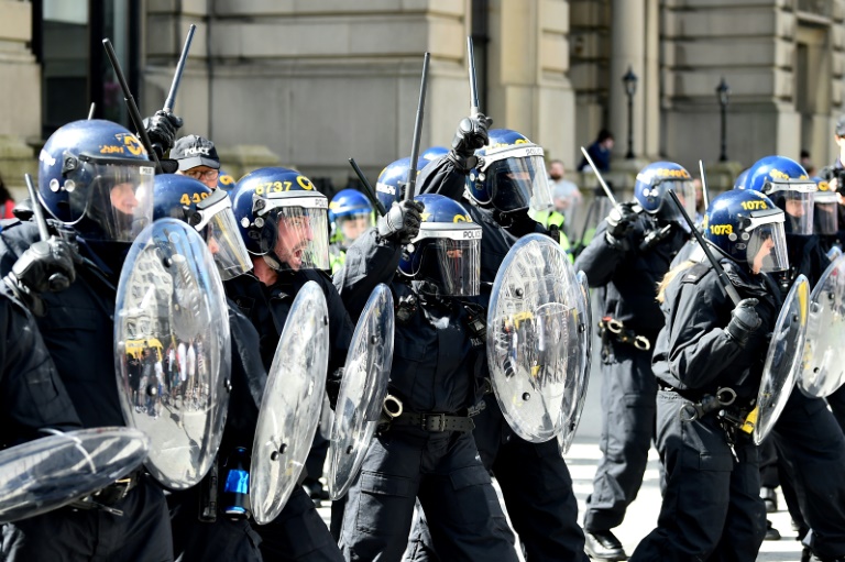 Far-right protesters threw bricks at police in the northwestern English city of Liverpool