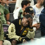 Travis Scott was seen attending the Olympics men's basketball semi-finals on Thursday evening