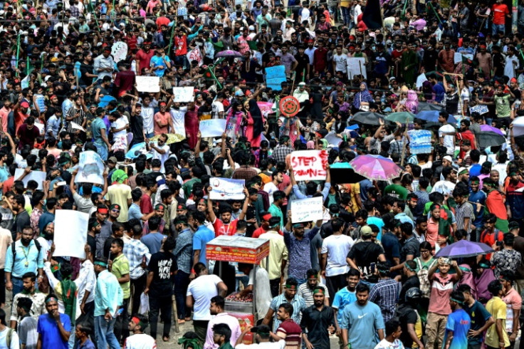 Analysts fear violence may surpass that seen on Sunday, when hundreds of thousands of Bangladeshi protesters clashed with government supporters countrywide, with the rival sides battling with sticks and knives and security forces firing rifles.