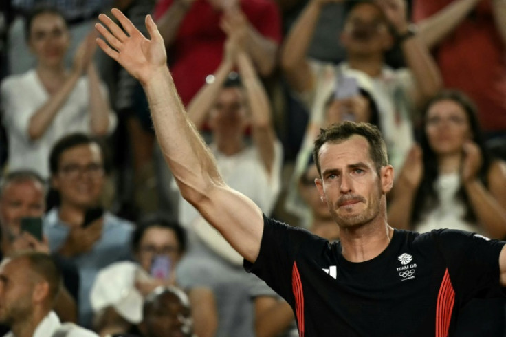 Britain's Andy Murray waves goodbye after playing the last match of his career