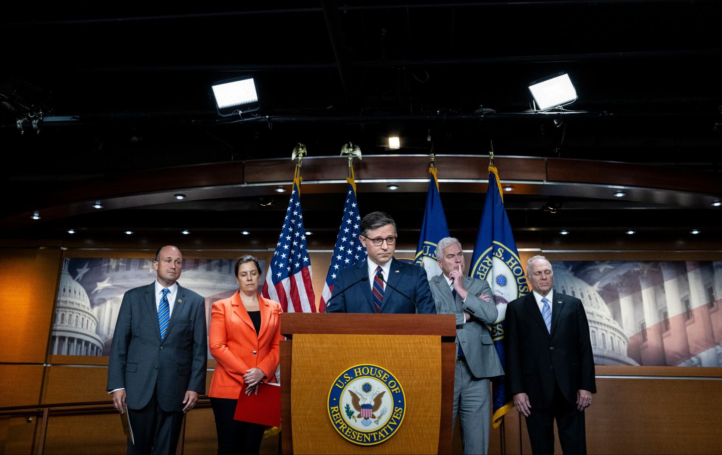 House Speaker Mike Johnson with fellow Republican members of the House at a news conference at the Capitol in July.