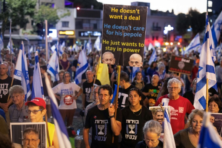 Israeli anti-government protesters rally calling for a hostage release deal, in the coastal city of Haifa