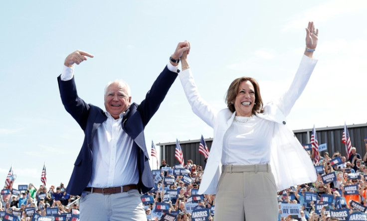 Kamala Harris and her running mate Minnesota Governor Tim Walz greet supporters at a campaign rally in Eau Claire, Wisconsin