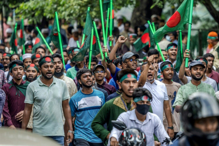 A mob wielding bamboo rods and plastic pipes in Bangladesh accosted several suspected supporters of Sheikh Hasina on Thursday, vowing to quash a rumoured rally for the ousted premier outside her childhood home