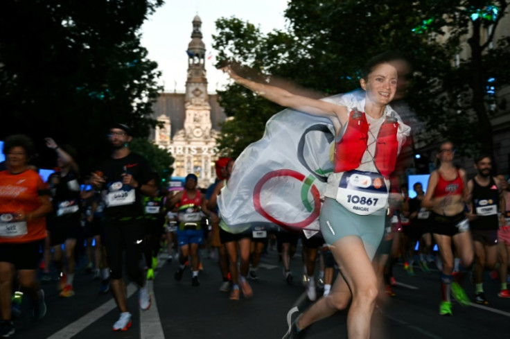 One runner had donned an Olympic cape