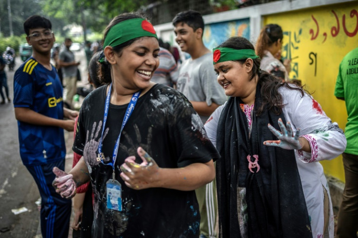 Some of the students who led the protests against ousted prime minster Sheikh Hasina are daubing slogans on the streets, covering the old images of the former government in favour of messages of hope