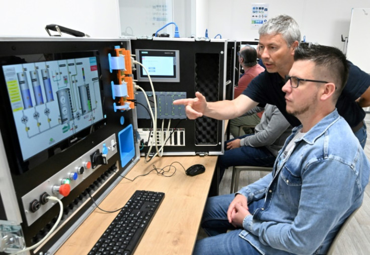 Stellantis employees train to work at the Douvrin battery factory