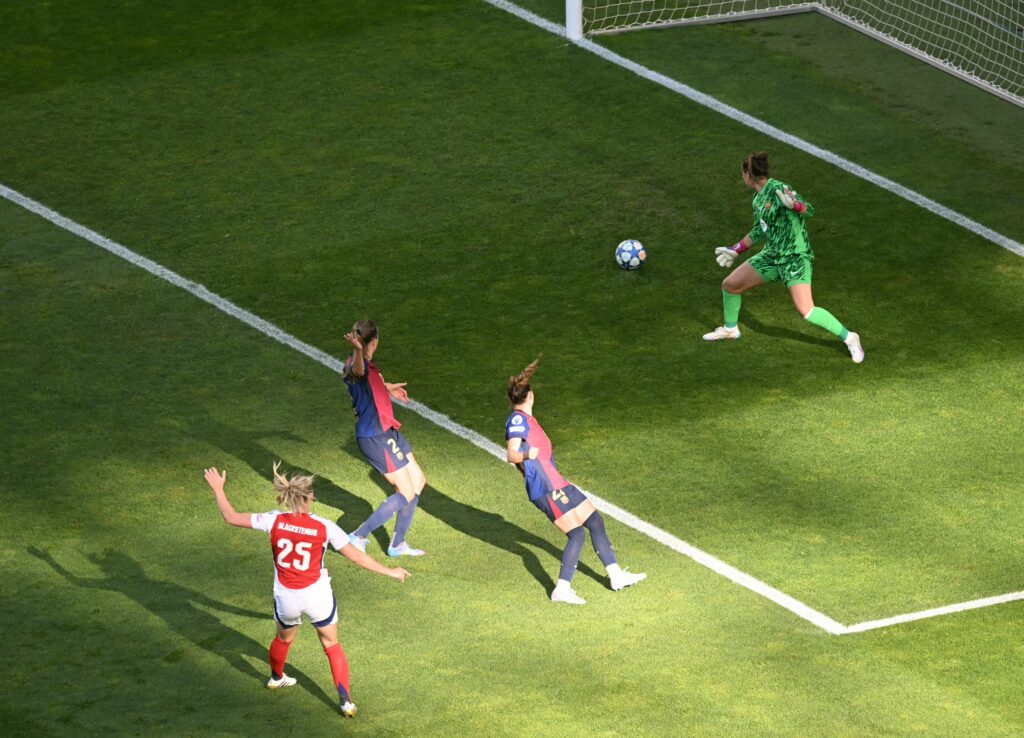Stina Blackstenius celebrates scoring against Barcelona in UWCL final