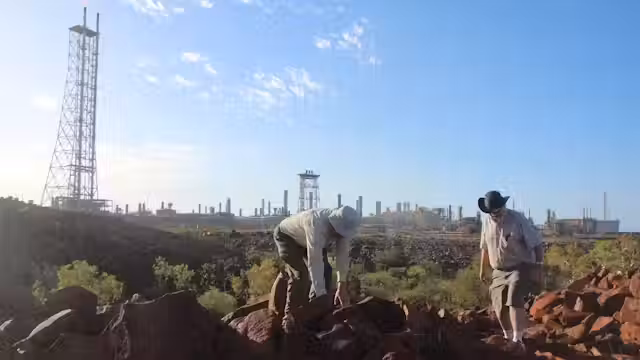 Ancient Murujuga rock art carvings eroding due to nearby gas industry pollution