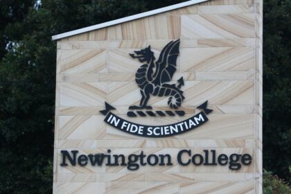 Newington College campus with coeducation announcement banner