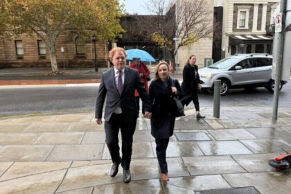 Richard Boyle walks into court after exposing ATO wrongdoing