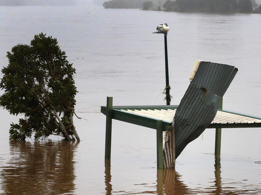 Floodwaters submerge roads in Sydney as residents face extreme weather disruptions