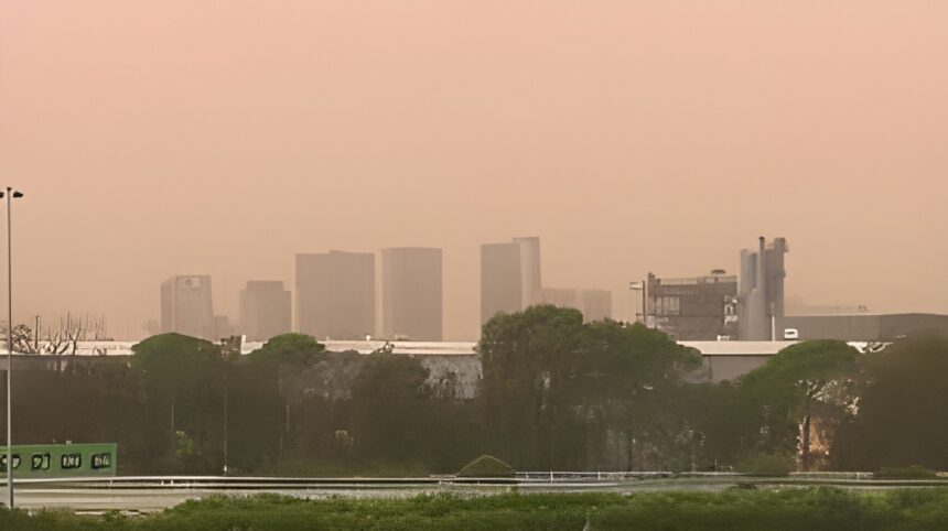 A dust storm sweeping through Sydney has turned the city skyline a shade of red.