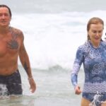 Nicole Kidman and Keith Urban smiling in Sydney backdrop