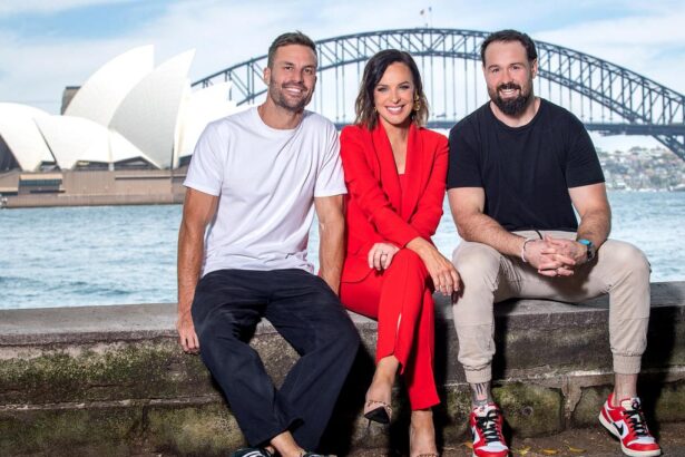 Beau Ryan and Aaron Woods in the Triple M radio studio looking concerned