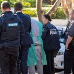 Jonathan Fagan escorted by undercover police after cocaine bust