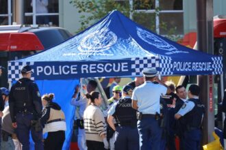 Emergency responders at the scene of a fatal light rail accident in Surry Hills, Sydney