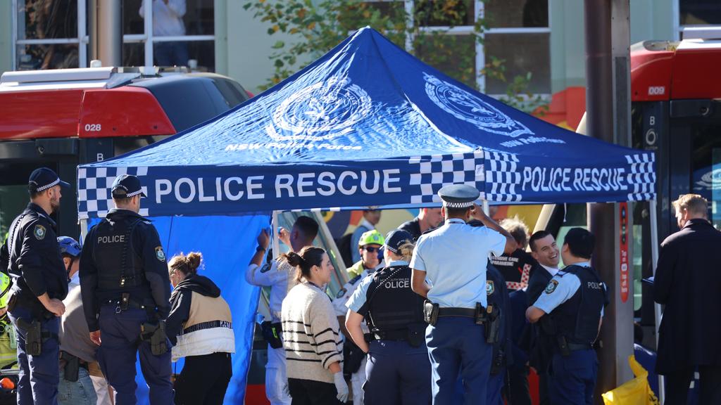 Emergency responders at the scene of a fatal light rail accident in Surry Hills, Sydney