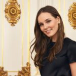 Princess Ingrid Alexandra arrives in Australia to begin studies at University of Sydney, smiling at the press.