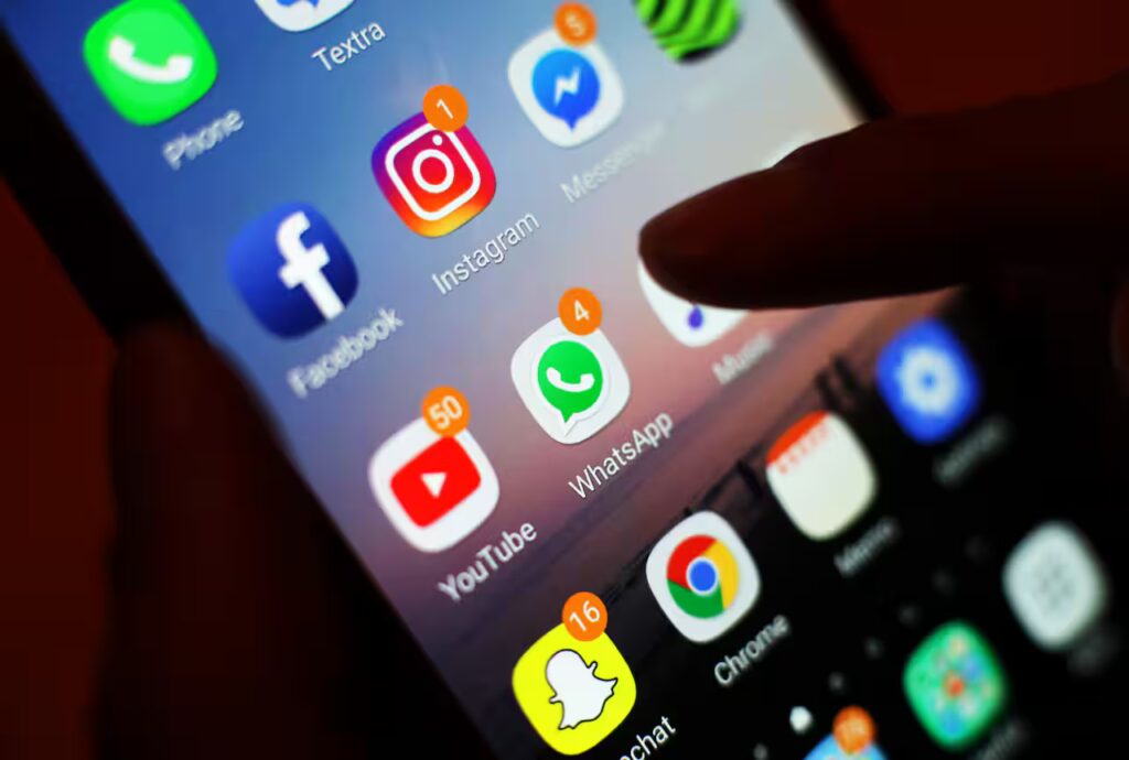 Social media apps on phone screen