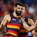 Adelaide Crows players celebrate after dominant 90-point win over Sydney Swans at SCG