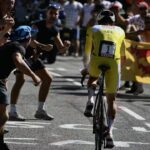 Slovenian rider Tadej Pogačar wearing the overall leader's yellow jersey cycles during the 13th stage of the 112th edition of the Tour de France cycling race. Source: AFP / Marco Bertorello